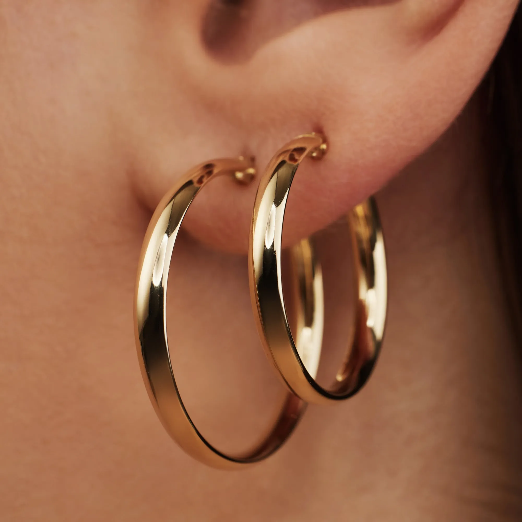 Rivoli Estrella 14 karat gold hoop earrings (20 mm)