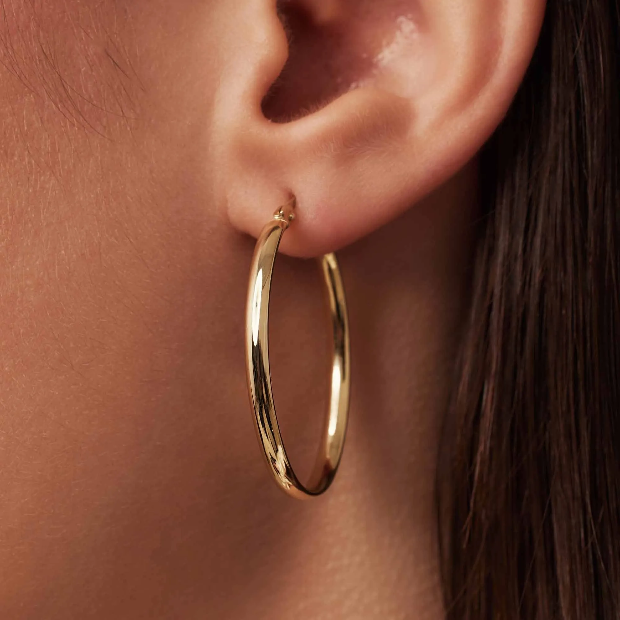 Rivoli Flori 14 karat gold oval hoop earrings (32 mm)